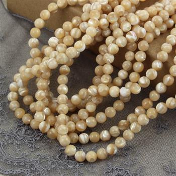 Muszla karmelowa kula gładka 5mm [sznur 39cm]