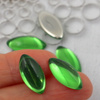 Kaboszon szklany Lt. Green - Silver Foiled wrzeciono 20x10mm