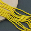 Kryształek szklany oponka fasetowana żółta 4x3mm [sznur 42cm]
