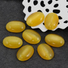 Kaboszon kocie oko owal żołty 18x13mm
