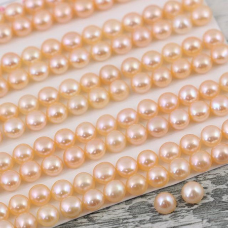 Perła j. różowa do połowy wiercona 5-5,5mm [para]