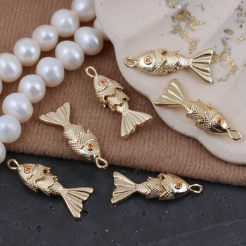 Zawieszka ryba z cyrkonią mosiądz złocony 22x7mm