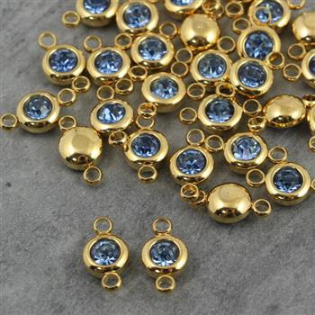 Stal szlachetna łącznik w oprawie ZŁ light shapphire 6mm