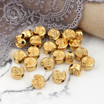 Przekładka muszla stal szlachetna pozłacana 8mm