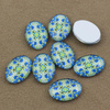 Kaboszon szklany z grafiką owal 18x13mm
