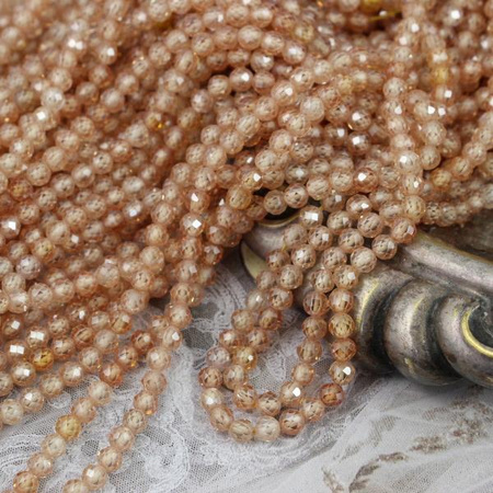 Cyrkonia kula fasetowana brzoskwiniowa 4mm [sznur 39cm]