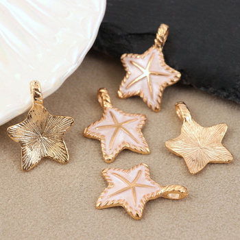 Zawieszka złota emaliowana rozgwiazda beżowa 28x22mm