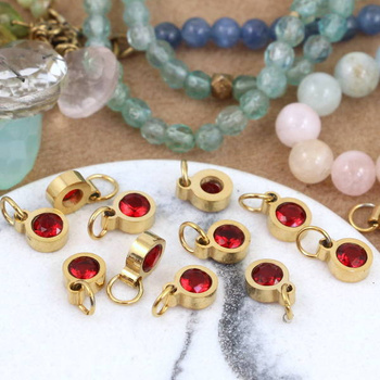 Stal szlachetna pozłacana PVD zawieszka czerwona w oprawie ZŁ 6mm