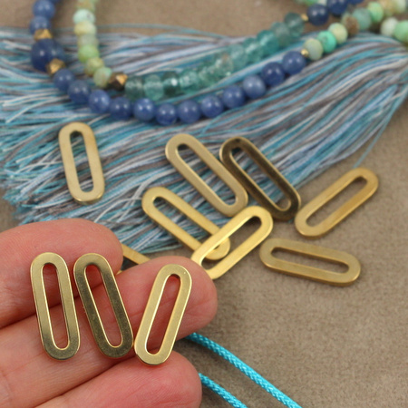 Baza ramka łącznik owal stal szlachetna pozłacana 19x7mm