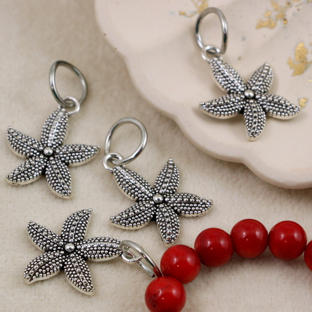 Zawieszka metalowa rozgwiazda srebrna 22x18mm