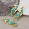 Zawieszka konik morski mosiądz złocony emaliowana turkusowa 30x11mm