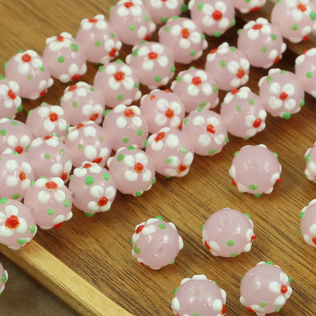 Koralik szklany w kwiatki różowy 13x12mm