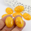 Kaboszon z żywicy owal żółty 25x18mm