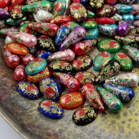 Kaboszon z żywicy pomarańczowy w kwiaty owal 25x18mm