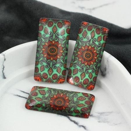 Kaboszon szklany z grafiką ornament pomarańczowy 38x19mm