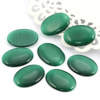 Kaboszon kocie oko owal szmaragdowy 25x18mm