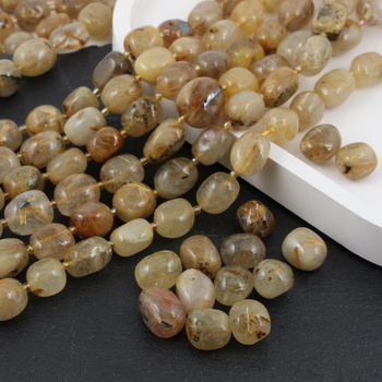 Kwarc ze złotym rutylem beczka oliwka 15x12mm