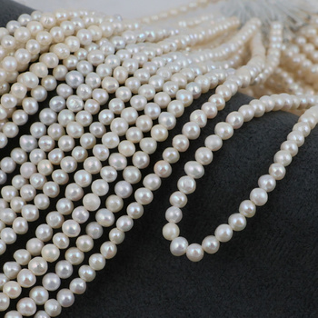 Perła słodkowodna biała kula 4mm [sznur 39cm]