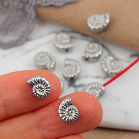 Przekładka muszla stal szlachetna srebrna 9x7mm