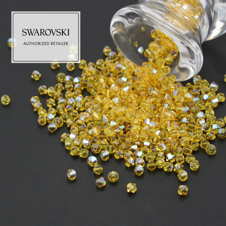 5328 Swarovski Xilion Bead 4mm Light Topaz Shimmer [6szt]