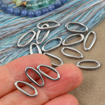 Łącznik nieregularny owal stal szlachetna 14x7mm