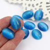 Kaboszon kocie oko owal niebieski 20x15mm