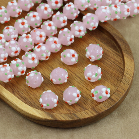 Koralik szklany w kwiatki różowy 13x12mm