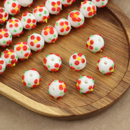 Koralik szklany w kwiatki biały 13x12mm