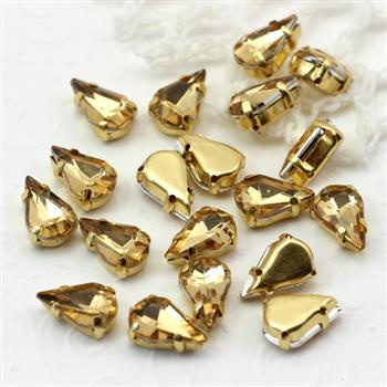 Kaboszon w oprawie łezka fasetowana beżowa 13x8mm