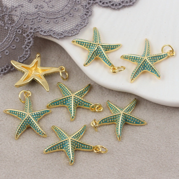 Zawieszka rozgwiazda mosiądz złocony emaliowana turkusowa 18mm