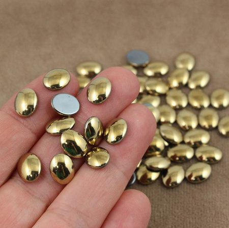 Kaboszon hematyt owal złoty 10x8mm