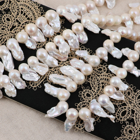 Perła słodkowodna baroque biała 25x10mm