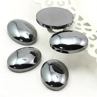 Kaboszon hematyt grafitowy owal 25x18mm