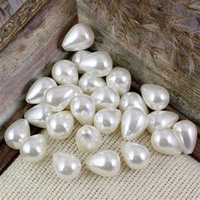 Perła seashell kropla biała 14x10mm