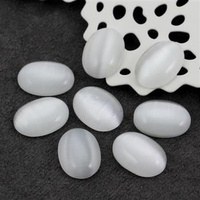 Kaboszon kocie oko owal biały 18x13mm