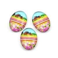 Kaboszon szklany z grafiką owal krajobraz 18x13mm