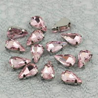 Kaboszon w oprawie łezka fasetowana flamingo 13x8mm