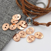 Guzik metalowy owalny różowe złoto 14x11mm