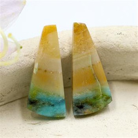 Kaboszony opal blue 25x11x4mm [para]