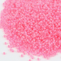 Toho Round 11/0 Inside-Color Crystal/Neon Carnation-Lined [10g]