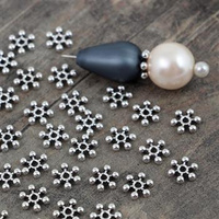 Przekładka metalowa kwiatek srebrny 7x2mm [30szt]