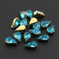 Kaboszon w oprawie łezka fasetowana niebieska 13x8mm