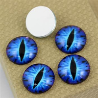 Kaboszon szklany z grafiką oko moneta niebieska 20mm