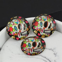 Kaboszon szklany z grafiką moneta czaszka 25mm