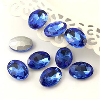 Kaboszon szklany owal fasetowany royal blue 18x13mm