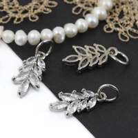 Zawieszka metalowa mosiądz liść z cyrkoniami 17mm