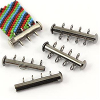 Zapięcie wsuwane czarne na 4 sznury [lupik w pionie]