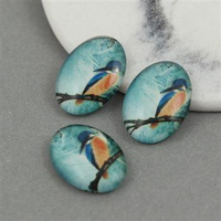 Kaboszon szklany z grafiką owal motyw ptaszka 18x13mm