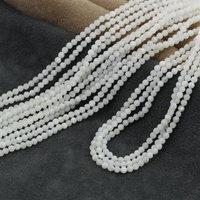 Muszla fasetowana kremowa kula 3mm [sznur 39cm]