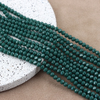 Kryształek szklany oponka fasetowana c. zielona 4x3mm [sznur 42cm]